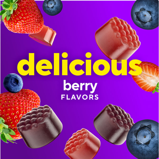 Delicious berry flavors Women's Multi Gummies with red and dark gummies, whole and cut strawberries, and blueberries.