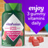 Vitafusion Women's Power Plus Multi Gummy, 90 Count Dietary Supplement bottle with three red gummies.