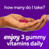 Hand holding three pink VF Hair, Skin & Nails Gummy vitamins. Text reads 'enjoy 3 gummy vitamins daily'.
