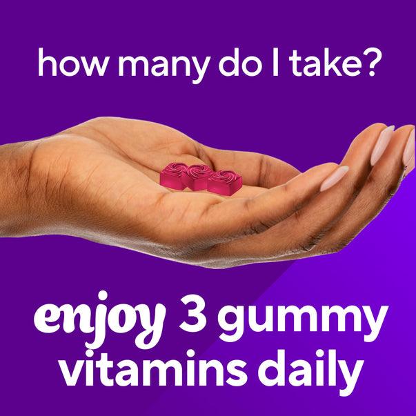 Hand holding three pink VF Hair, Skin & Nails Gummy vitamins. Text reads 'enjoy 3 gummy vitamins daily'.