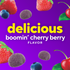 Purple sugar-coated gummies with strawberries, blueberries, and cherries. Text: delicious boomin' cherry berry FLAVOR.