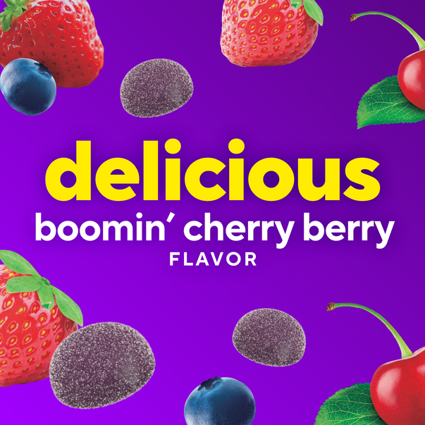 Purple sugar-coated gummies with strawberries, blueberries, and cherries. Text: delicious boomin' cherry berry FLAVOR.