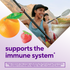 Two women kayaking on a lake with mountains; an orange, a strawberry, and text 'supports the immune system'.