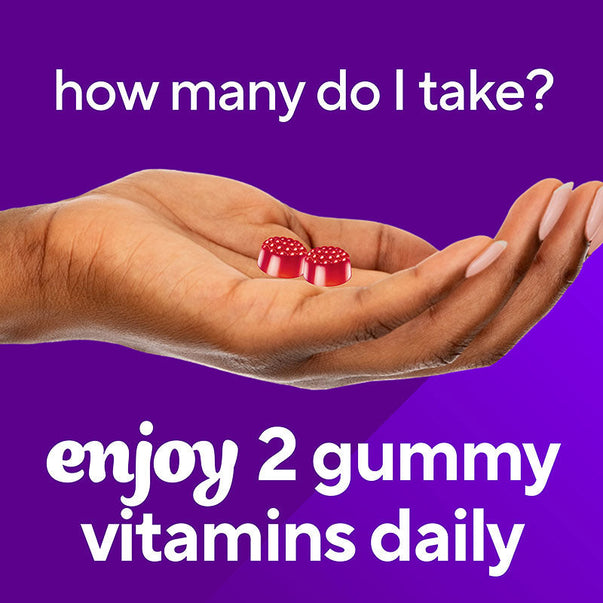 Two red VF Extra Strength B12 3,000 mcg gummies in a hand. Text: 'Take 2 gummies daily for enjoyment and health benefits.'