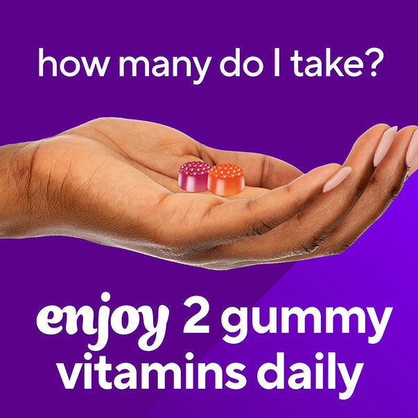 A hand holds two VF Probiotic 5 Billion CFU gummy vitamins. Text advises: 'Enjoy 2 gummy vitamins daily.'